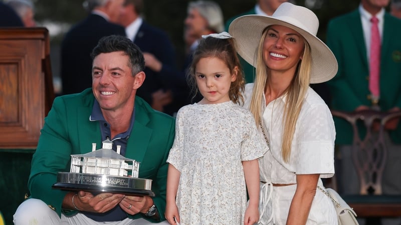 Rory McIlroy poses with daughter Poppy and wife Erica Stoll