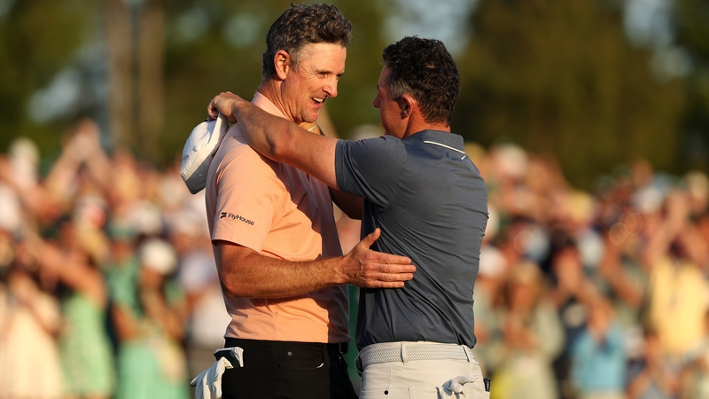 Justin Rose congratulates Rory McIlroy