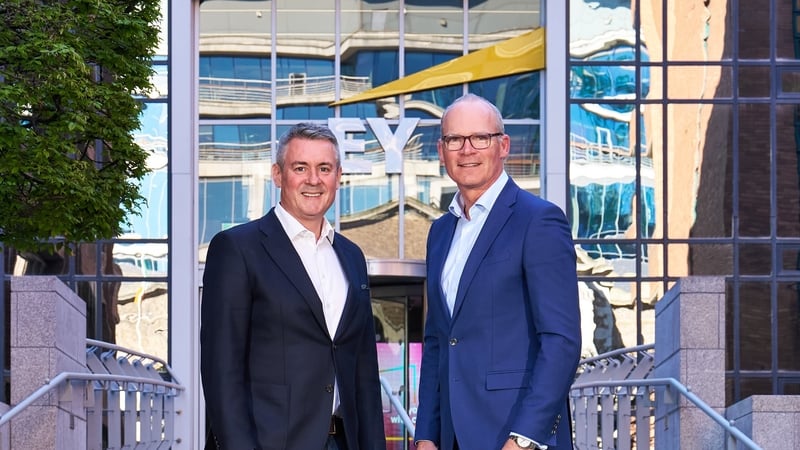 Frank O'Keeffe, EY Ireland Managing Partner, and Simon Coveney