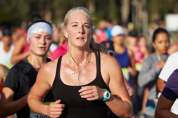 Female Athlete Approaching The Finish Line In The Nike Woman's Half Marathon, San Francisco, 2015.
