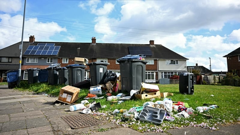 Hundreds of workers have been on all-out strike for a month, leading to rubbish piling up on the streets