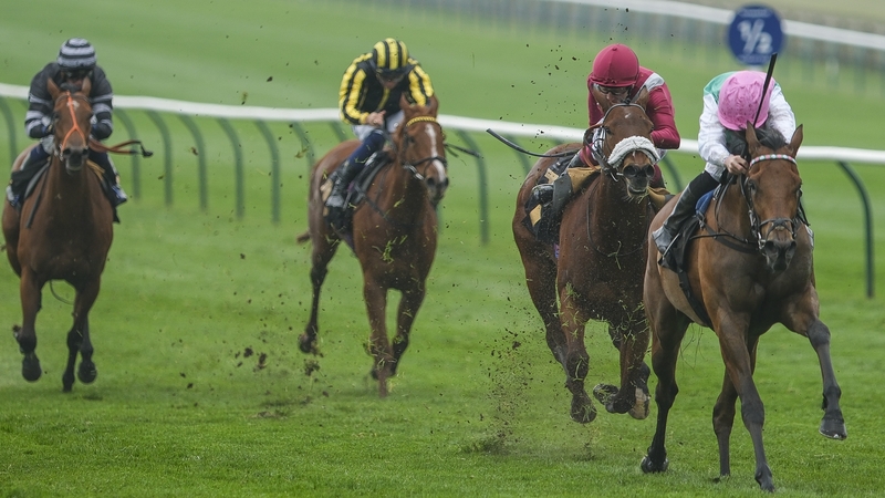 Zanzoun (pink cap) quickens clear of her rivals under Kieran Shoemark in the Nell Gwyn