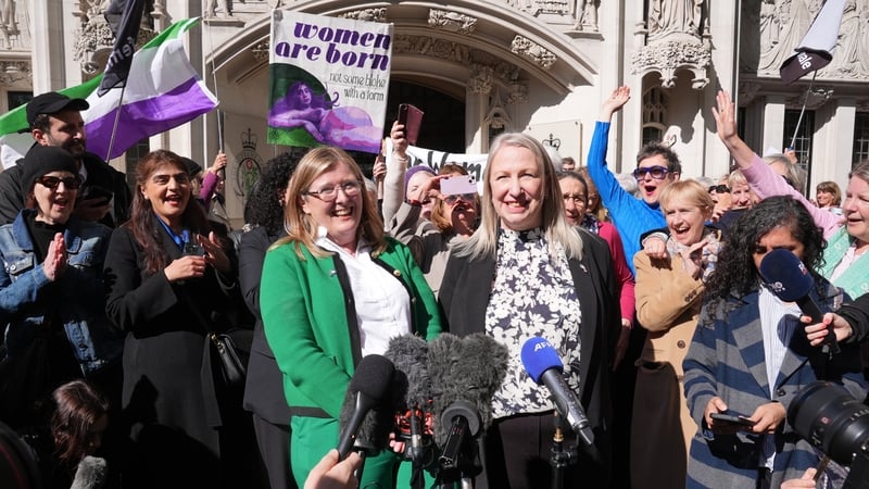 Susan smith (centre left) and Marion Calder (centre right) co-directors of For Women Scotland with campaigners celebrate outside the Supreme Court