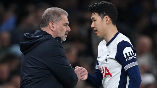 Ange Postecoglou shakes hands with Son Heung-min as he leaves the field after being substituted in last week's first leg