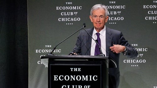 Jerome Powell arrives to speak during an Economic Club of Chicago event