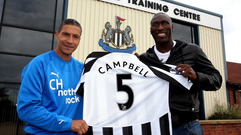 Sol Campbell (R) with Chris Hughton in 2010 after he signed for Newcastle United