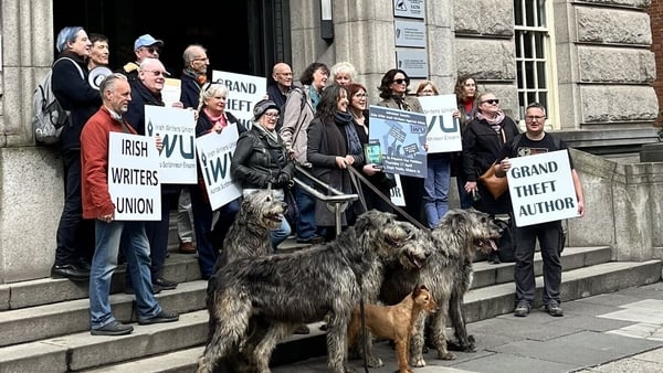 Members of the IWU submitting the petition to Minister of State Niamh Smyth