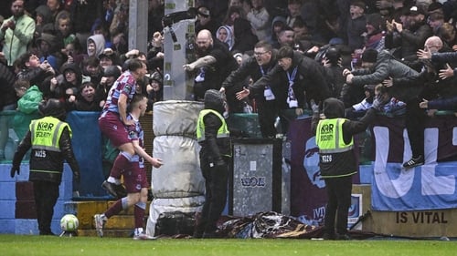 Warren Davis Owen Lambe celebrate with the Drogheda fans