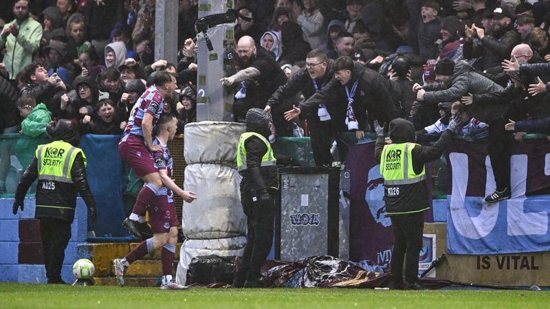 Warren Davis Owen Lambe celebrate with the Drogheda fans