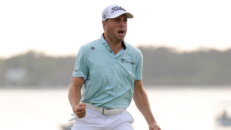 Justin Thomas celebrates after overcoming Andrew Novak in a playoff