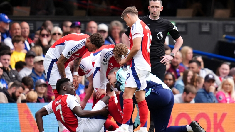 Bukayo Saka needed treatment after a heavy tackle from Ipswich defender Leif Davis