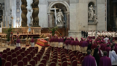 The moment Pope Francis's coffin is placed by altar in St Peter's Basilica