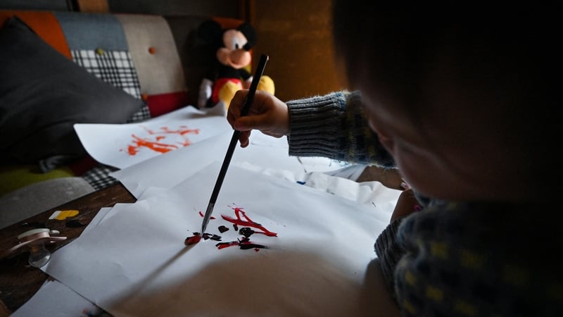 Paintings by the toddler artist - known as 'Thumbelina' - are on display at a gallery in Tokyo