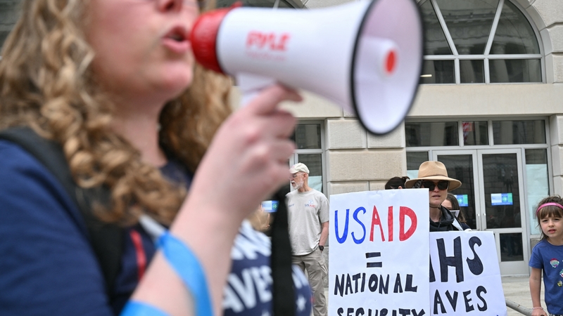 Demonstrators outside USAID offices on 5 April for a nationwide 'Hands Off!" protest against DOGE cuts