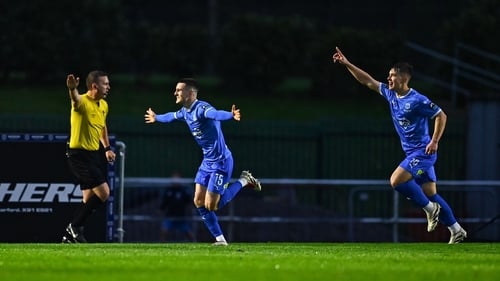 Waterford's Darragh Leahy, left, after opening the scoring at the RSC