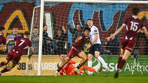 Moses Dyer (centre) wheels away in celebration