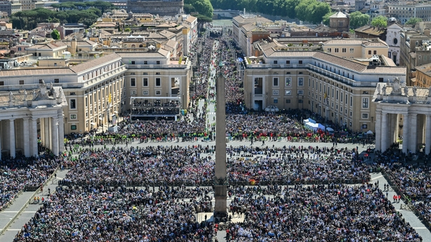 Crowds throng St Peter's Square for the funeral mass