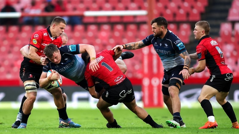Connacht captain Cian Prendergast is tackled by Morgan Naude