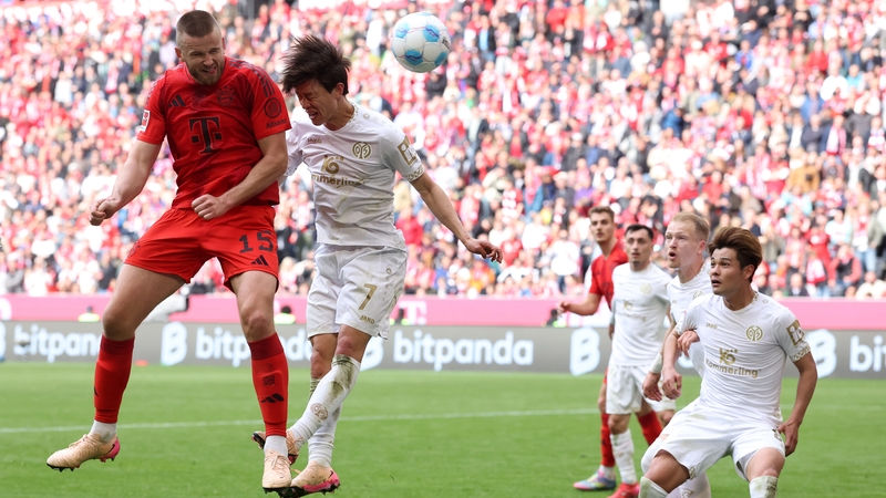 Eric Dier heads home Bayern Munich's third goal against Mainz