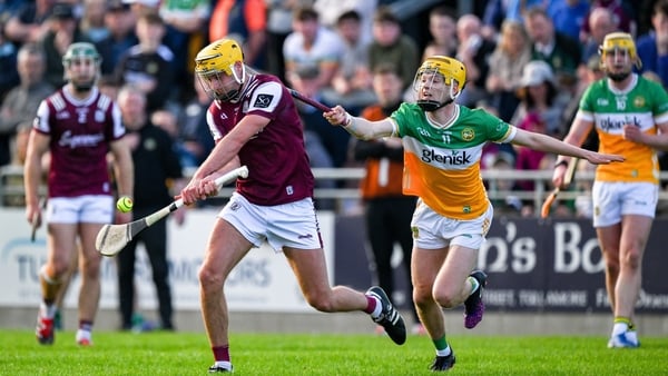 Tiernan Killeen of Galway evades Offaly's Dan Bourke