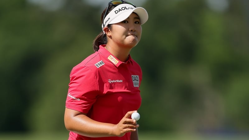 Haeran Ryu acknowledges the crowd after a putt on the 18th green
