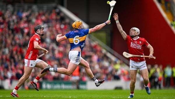 Ronan Maher and Luke Meade with eyes on the ball during last year's Munster round-robin clash between Cork and Tipp