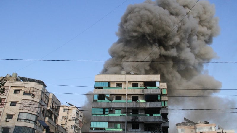 Smoke billows from the site of an Israeli attack on a building in Beirut's southern suburb