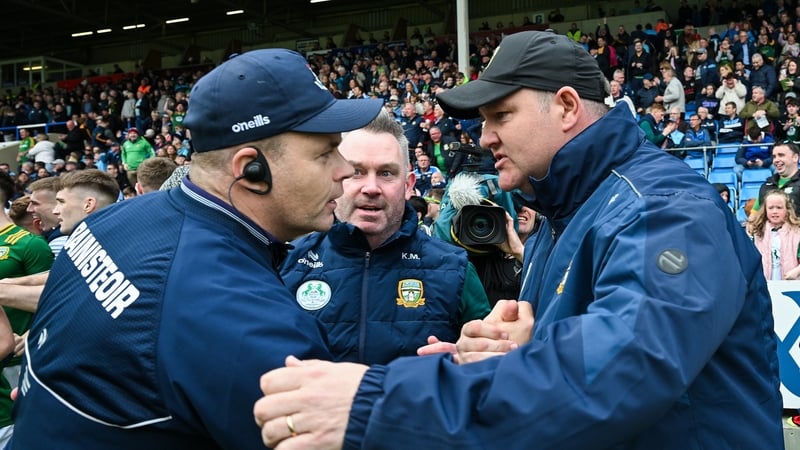 Dessie Farrell congratulates Robbie Brennan after a historic Leinster Football Championship semi-final