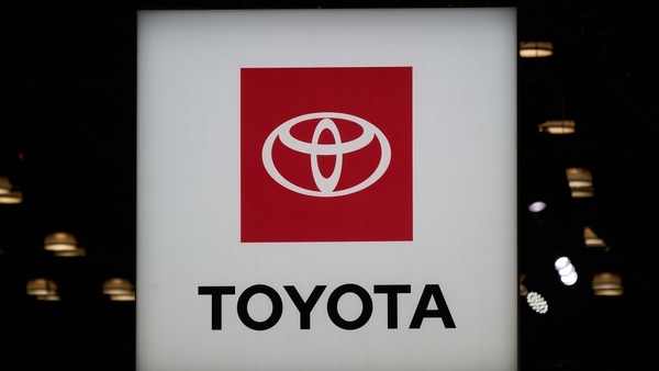 The world's biggest automaker cut its operating profit forecast for the financial year to end-March 2026