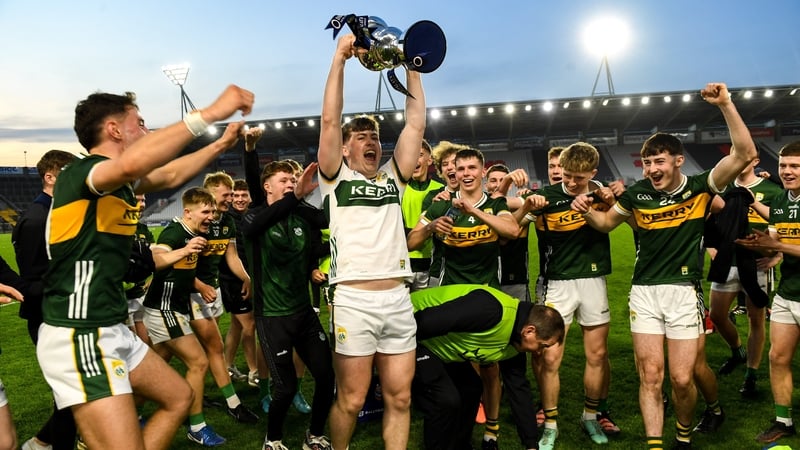 Kerry captain Michael Tansley lifts the cup after his team's victory at Páirc Uí Chaoimh