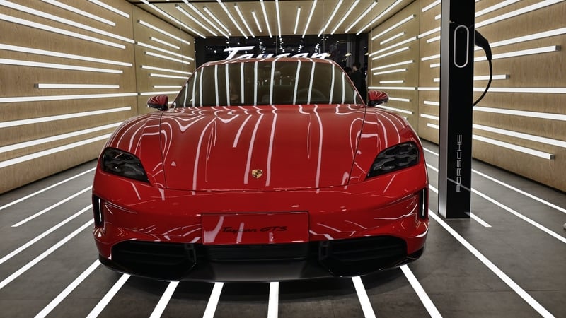 Porsche cut its profitability guidance on Friday and announced a delay in the launch of some all-electric models