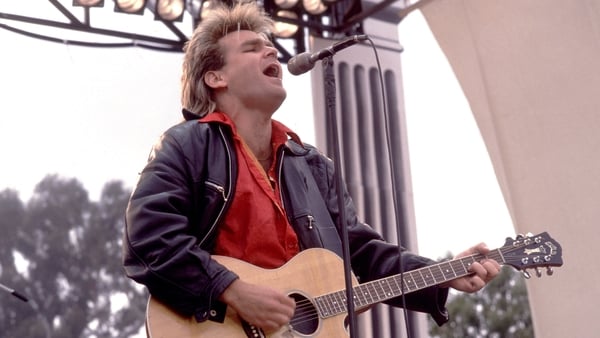Mike Peters, pictured on stage with The Alarm in Los Angeles, California in April 1986