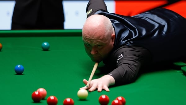John Higgins eased past Stephen Maguire in the semi-final