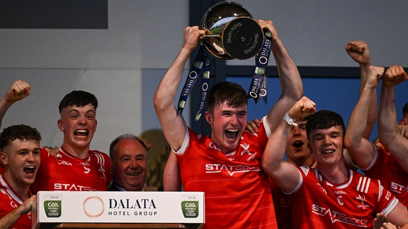Louth captain Sean Callaghan liifts the trophy