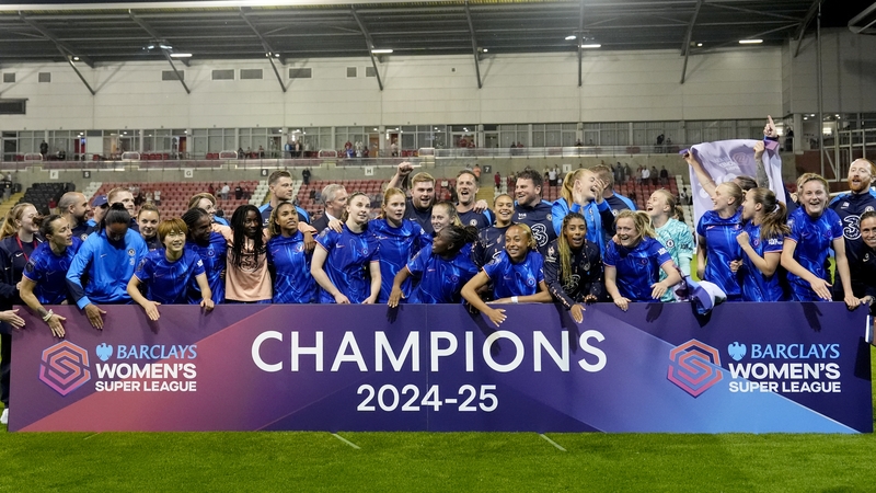 Chelsea players celebrate their triumph in Manchester