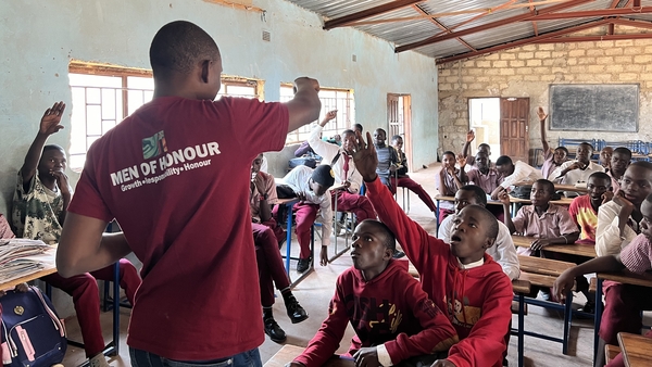A workshop in a suburb of Lusaka, Zambia centred on teaching boys why women and girls should have the same rights as them