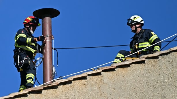 Workers Sistine Chapel chimney