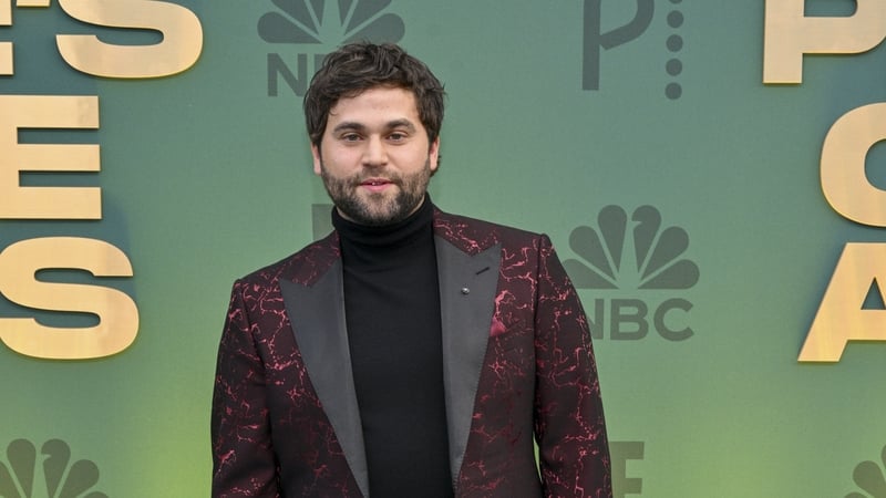 Jake Borelli plays Levi Schmitt