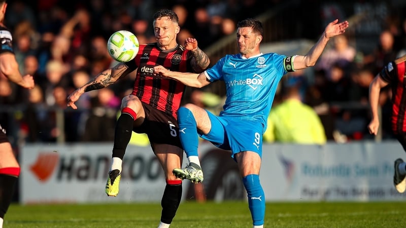 Waterford's Padraig Amond, right, and Rob Cornwall of Bohemians battle for possession