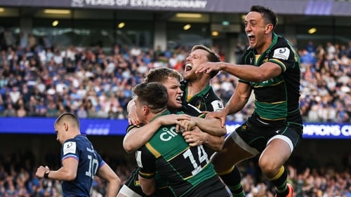 Northampton players celebrate one of Tommy Freeman's three tries