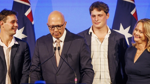 Peter Dutton, Australia's opposition leader, delivers his concession speech while surrounded by his family