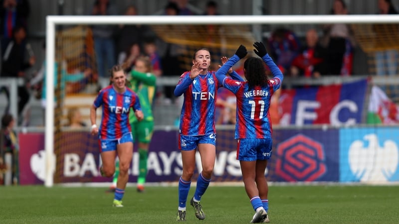Abbie Larkin, left, celebrates her goal with Crystal Palace team-mate Ashleigh Weerden