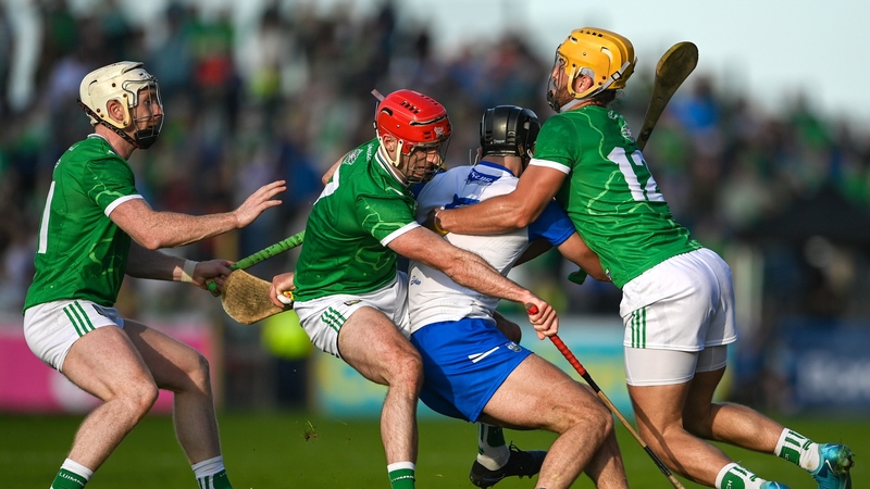 Waterford's Mark Fitzgerald is tackled by, from left, Cian Lynch, Tom Morrissey and Barry Nash