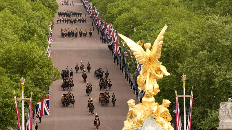 Members of Britain's armed forces march on The Mall during the military procession