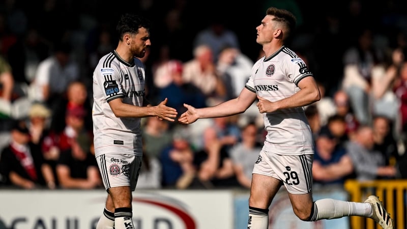 Sean Grehan of Bohemians (R) celebrates with team-mate Jordan Flores after the first of his two goals