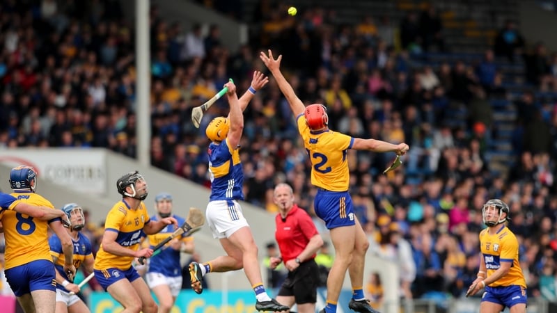 Tipperary's Ronan Maher, left, and Peter Duggan of Clare compete in the air during last year's Munster SHC round-robin clash