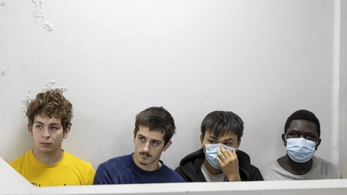 (L-R) Belgian nationals Lornoy David and Seppe Lodewijckx sit in the dock during the delivery of their sentences alongside their co-accused Vietnamese Duh Hung Nguyen and Kenyan national Dennis Ng'ang'a