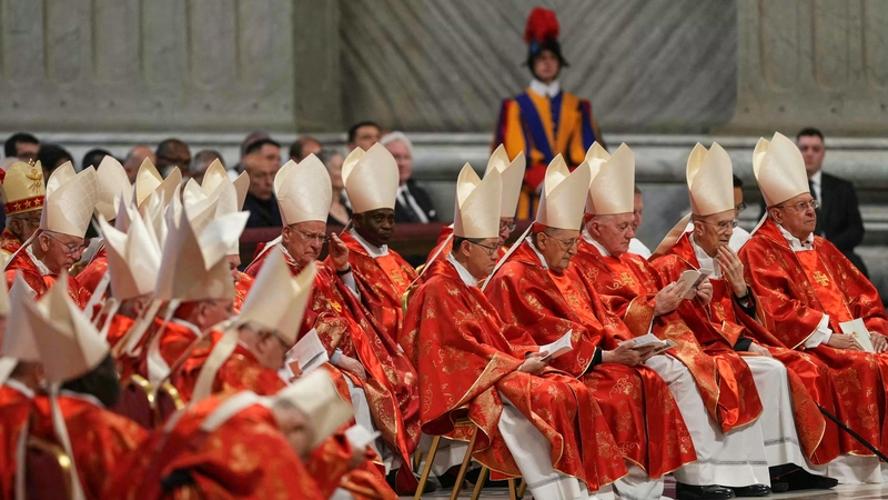 Cardinals attend a mass for the Election of the Roman Pontiff, prior to the start of the conclave, at St Peter's Basilica