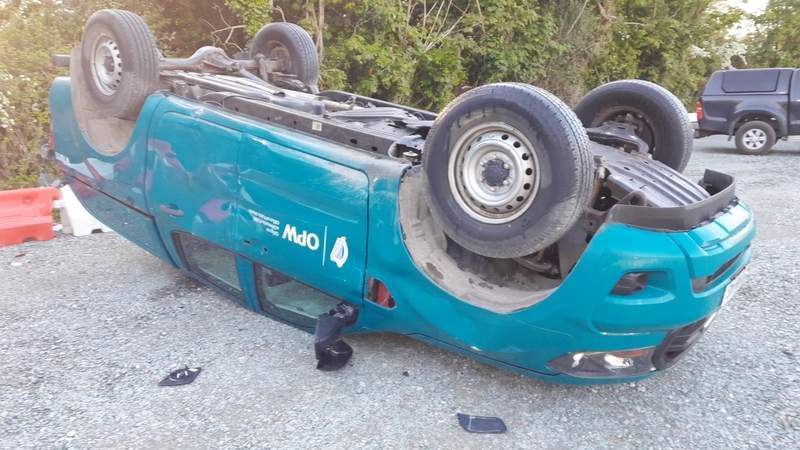 Four vehicles were overturned and a construction vehicle was driven into a river