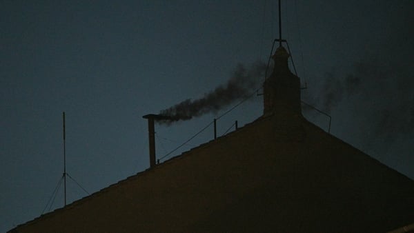 Black smoke has emerged from the Sistine Chapel chimney, signalling no new pope has been elected